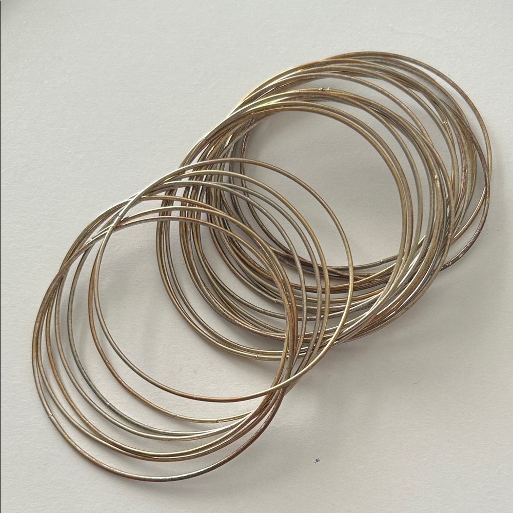 25 metal bangles, 2 1/2” circumference